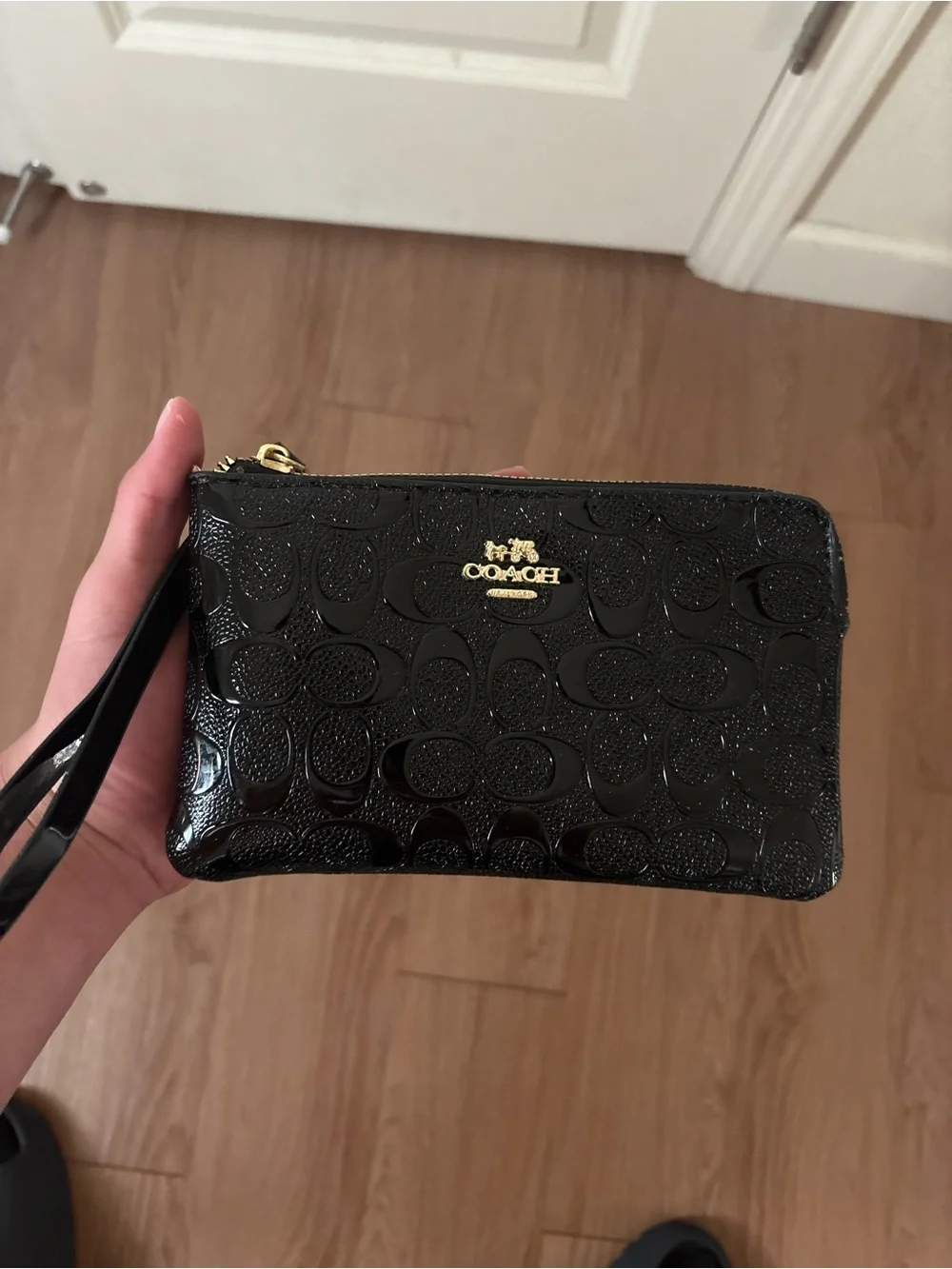 Coach Black Patent Signature Wristlet with Gold Logo